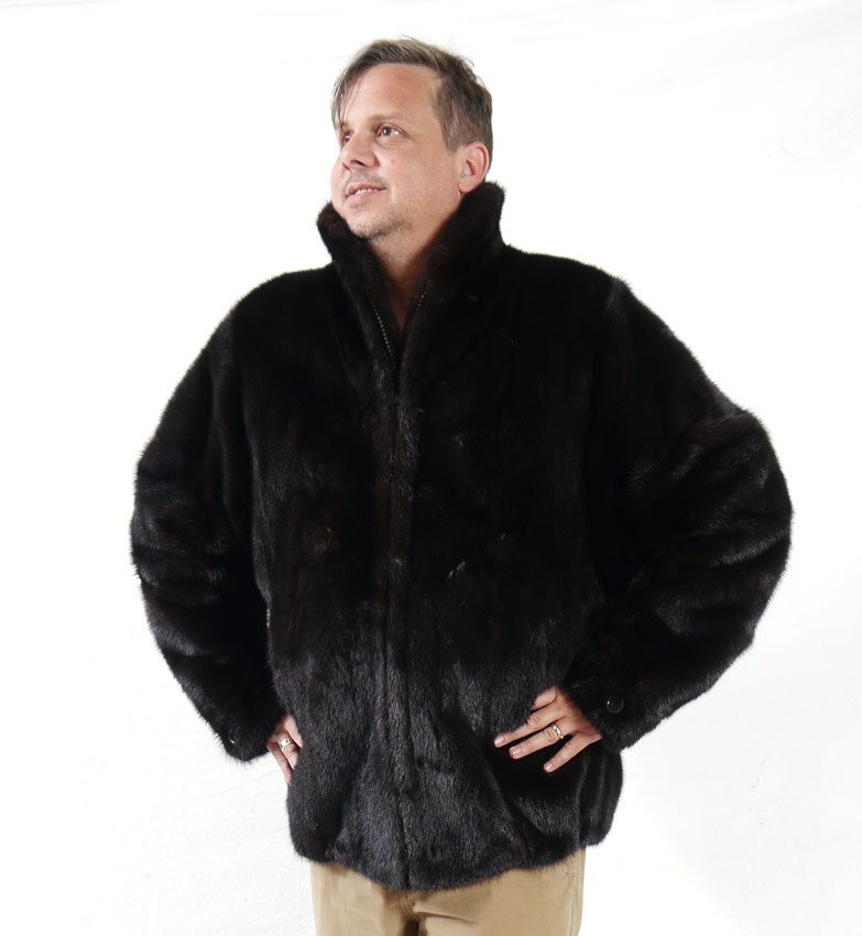 A MAN'S BLACK FUR JACKET: A MAN'S LUSTROUS BLACK FUR JACKET: Zipper front, Furs by Winell New York label. Measures approx. 32" collar to bottom, 26" shoulder to cuff and 21" shoulder to shoulder.