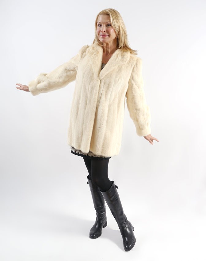 BLOND MINK FUR COAT / JACKET: BLOND MINK FUR JACKET: Car coat length with wide lapel collar. Amartin Furs of South Florida label. Approx. measurements Collar to bottom: 32". Shoulder to shoulder: 17". Shoulder to cuff: 24".