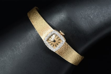 ELEGANT LONGINES LADIES GOLD WATCH W/ DIAMONDS