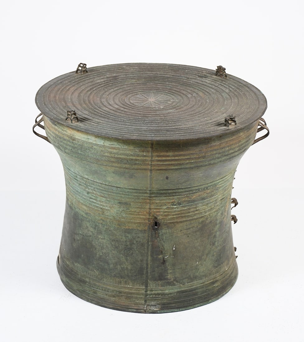 18TH-C. BURMESE KAREN BRONZE FROG MOTIF RAIN DRUM: 18TH-C. BURMESE KAREN BRONZE FROG MOTIF RAIN DRUM: Southeast Asia, Burma (Myanmar) and Thailand, Karen people, ca. 18th to 19th century CE. A leaded bronze rain or frog drum, created by the Karen - a