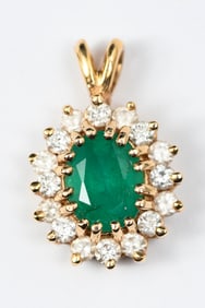 14K OVAL EMERALD AND DIAMOND PENDANT
