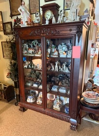 CARVED TIGER OAK 2-DOOR CLAW FOOT BOOKCASE