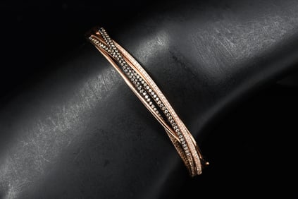INTRIGUING 14K ROSE GOLD DIAMOND BANGLE
