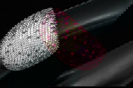 SPECTACULAR 18K DIAMOND RUBY & PINK SAPPHIRE CUFF: SPECTACULAR 18K DIAMOND RUBY & PINK SAPPHIRE CUFF: 18K Yellow gold cuff holds one thousand three hundred and forty-seven round mixed cut rubies (approx. 113.60 Ct.), two hundred sixty-eight round mixe