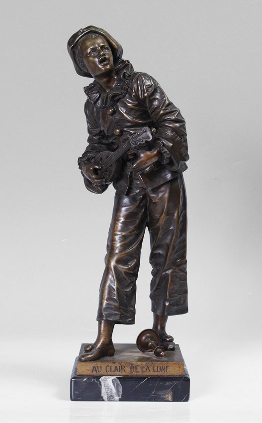 BOURET BRONZE "AU CLAIR DE LA LUNE": BOURET, Eutrope, (French, 1833-1906): "Au Clair de la Lune", Depicting a Clown Minstrel Bronze, 18" h., affixed to a black marble plinth, overall measurements 19 1/2", incised signature to base.