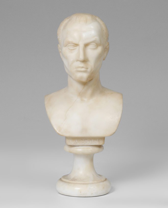 EXCELLENT ALABASTER BUST SCULPTURE OF YOUNG CAESAR: EXCELLENT ALABASTER BUST SCULPTURE OF YOUNG CAESAR: Approximately 12" h., affixed to a circular beveled plinth.