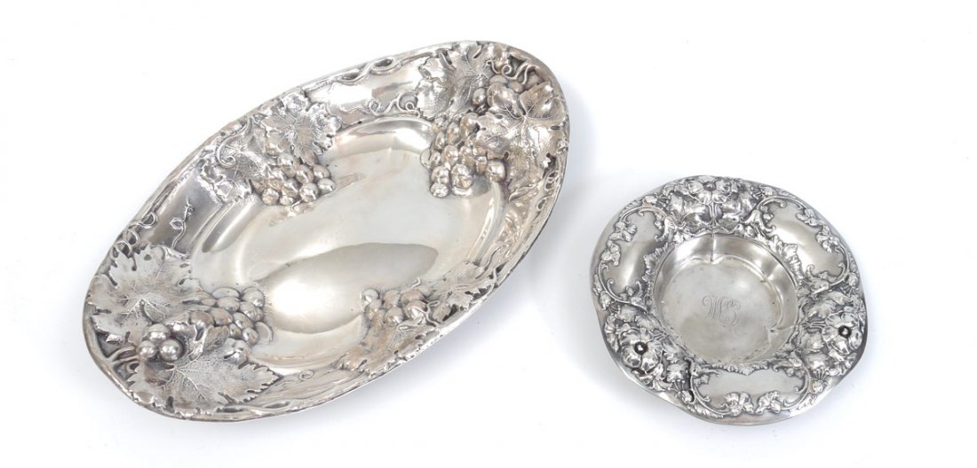 2 PIECE REPOUSSE STERLING SERVING DISHES: 2 PIECE REPOUSSE STERLING SERVING DISHES: 2 pieces to include 1) Mauser serving dish with grape vine motif rim. Marked with the Mauser mark, Sterling, 925/1000 Fine, 680. 1 3/4'' h. x 11'' x 7''. 2) G