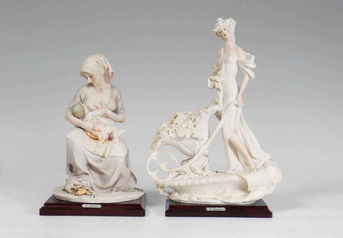 2 GIUSEPPE ARMANI FLORENCE FIGURINES 0237C & 1119C: 2 GIUSEPPE ARMANI FLORENCE FIGURINES: ''MOTHER BREAST FEEDING'', #0237 C?, 11''h. x 7'' x 7'' and ''LADY with FLOWER CART - La Cariolla'', #1119 C?, approx. 14''h. x 9 1/2'' x 5''.
