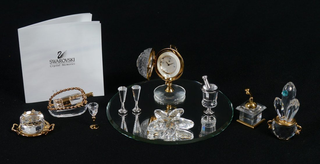 SWAROVSKI CRYSTAL MOMENT FIGURINES: SWAROVSKI CRYSTAL MOMENTS: ''7'' pieces to include, Celebrations Birthday Cake 9460 000 059; Times Past Coffee Mill 9460 000 001; Happy Moments Wine Cooler and 2 Flutes 9460 000 134 missing ''cloth'',
