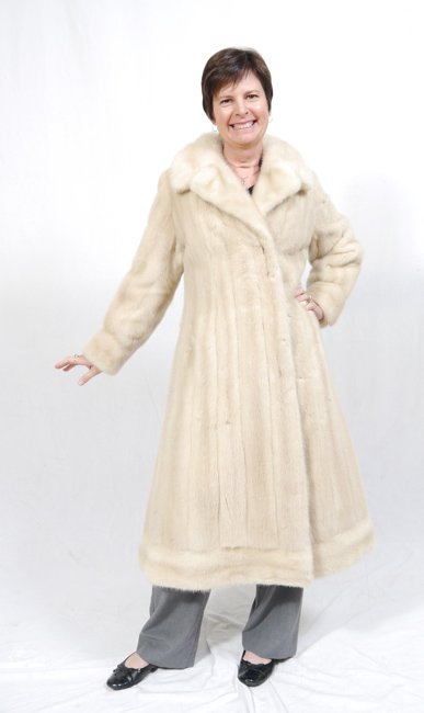 FULL LENGTH TOURMALINE MINK COAT: FULL LENGTH TOURMALINE MINK COAT: Light colored with beige tones, full sleeves with fitted cuff, band at the hem. Measures approx. 49" collar to hem, 19" shoulder to shoulder, and 20" shoulder to cuff