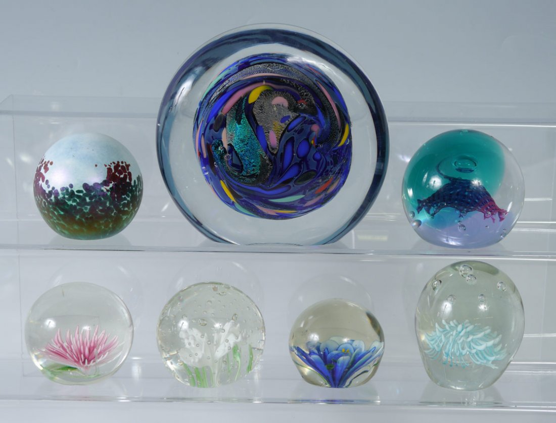 COLLECTION OF 7 ART GLASS PAPERWEIGHTS: COLLECTION OF 7 ART GLASS PAPERWEIGHTS: 7 pieces total to include 1) Rollin Karg, 1997, 6" dia. 2) Caithness "Time Traveler", 293/750, 3 1/2". 3) Phoenician Malta, 1988, 3". 4-7) 4 unsigned with flowe