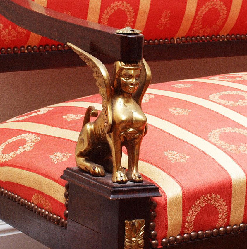5 PIECE FRENCH REGENCY STYLE PARLOR SET: 5 PIECE FRENCH REGENCY STYLE PARLOR SET: The settee and arm chairs with figural winged sphinx, all with applied ormolu decoration on top rails, front legs and paw feet. To include settee (39" h. x 47"