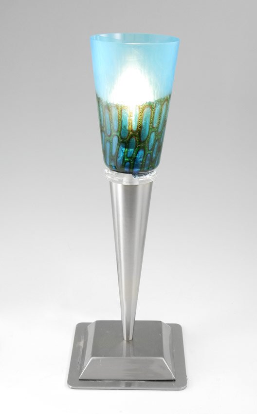 VALENTINA ITALIAN GLASS TABLE TORCHIERE: VALENTINA ITALIAN GLASS TABLE TORCHIERE: Signed light blue over dark blue outlined in green glass shade, brushed metal base. 14 7/8" h. x 5 1/2" square.