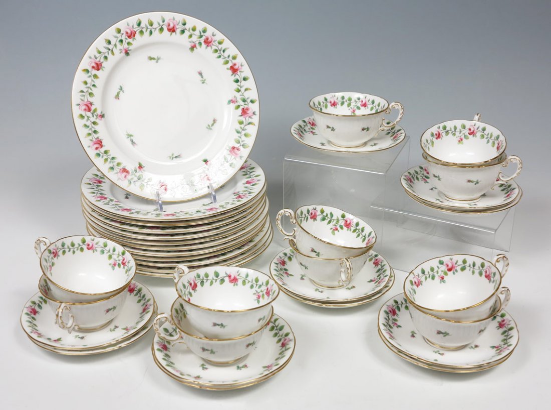 ROYAL WORCESTER FLORAL MOTIF CHINA LUNCHEON SET: ROYAL WORCESTER FLORAL MOTIF CHINA LUNCHEON SET: Approx. 35 pieces with floral rose motifs to include 12 plates (9"), 11 teacups and 12 saucers. Marked Royal Worcester W7473.