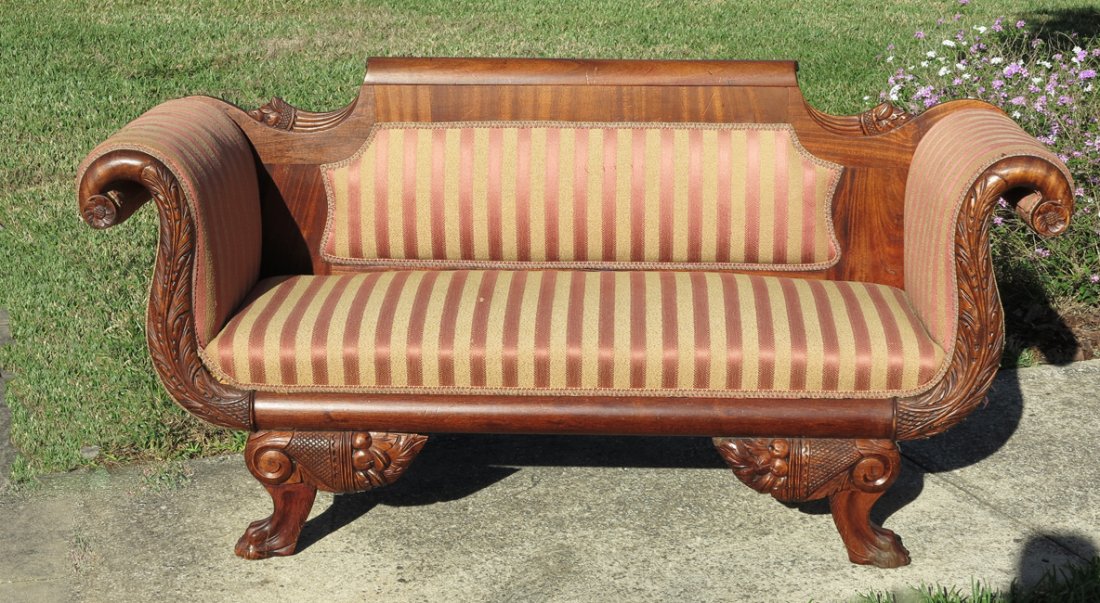 FEDERAL CARVED MAHOGANY SETTEE: FEDERAL CARVED MAHOGANY SOFA: Carved acanthus leaves to the scrolled arms, straight crest rail and skirt, carved legs and paw feet. Measures approx. 69" long x 24" x 30".