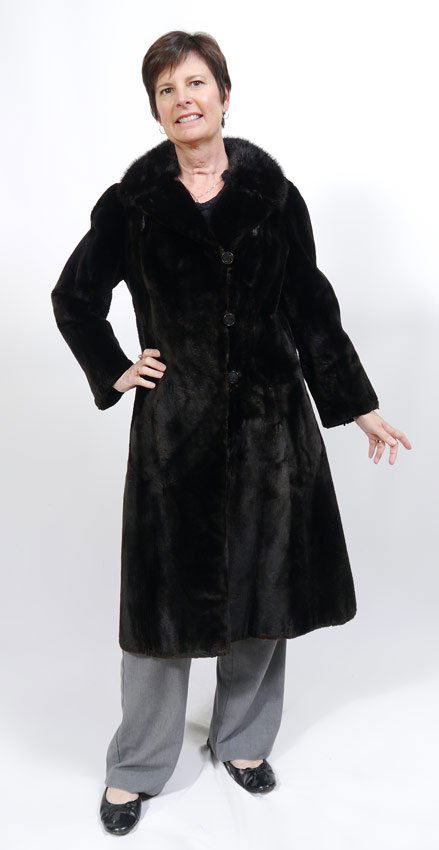 FULL LENGTH SEAL FULL COAT WITH MINK COLLAR: FULL LENGTH SEAL FULL COAT WITH MINK COLLAR: J Diamond label. Black seal with black mink collar, measures 44" collar to hem and 18" shoulder to shoulder.