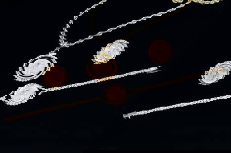 $5 ST. GAUDENS COIN JEWELRY SUITE: GOLD COIN JEWELRY SUITE: Suite consists of a pendant with a 1996 Saint Gaudens $5 gold coin in surround of black (onyx?) with a 14K gold rope bezel suspended from a 24" gold tone rope chain, a 14K