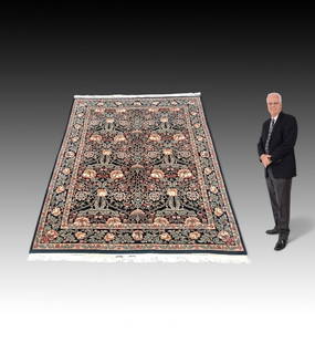 ESTATE ORIENTAL CARPET MANNER OF WILLIAM MORRIS: ESTATE ORIENTAL CARPET MANNER OF WILLIAM MORRIS: This richly ornamented carpet in the manner of William Morris, has a black field populated with an all over foliate Art Nouveau designs in shades of