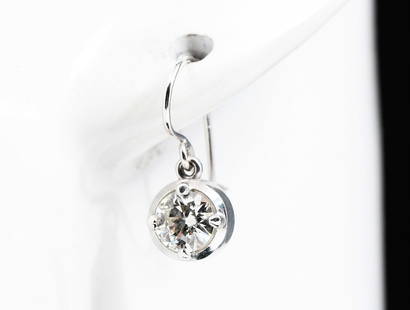 PLATINUM 14K DAZZLING DIAMOND DANGLE EARRINGS: PLATINUM 14K DIAMOND DANGLE EARRINGS: These dazzling diamond earrings contain 2 round brilliant cut diamonds mounted in platinum. WEIGHT: approximately 1.25 Ct. rated VS1 in clarity and H in color.