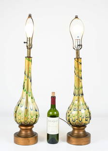 PR. MID CENTURY MURANO ART GLASS LAMPS: PR. MID CENTURY MODERN MURANO GLASS ART GLASS LAMPS: Pair of Mid Century Murano art glass Lamps, Circa 1960's, having an Amber ground with Green & Blue accents encompassing. Mounted on Gold painted