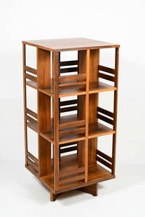 MCM DANISH ROSEWOOD ROTATING BOOKCASE: DANISH ROSEWOOD ROTATING BOOKCASE: A beautifully grained Mid Century Modern Danish Rosewood revolving Bookcase with three tiers. Approx. 43.5" h x 19.75" w x 19.75" d.