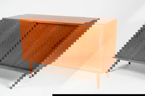 TEAK DANISH MID-CENTURY POUL HUNDEVAD CREDENZA: TEAK DANISH MID-CENTURY MODERN POUL HUNDEVAD CREDENZA: A mid century modern teak credenza with two sliding doors designed by Poul Hundevad. Made in Denmark. Raised on tapered round legs. Wood burned