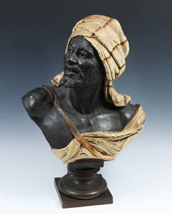 BLACKAMOOR CHALKWARE BUST SIGNED GIESECKE: BLACKAMOOR CHALKWARE BUST SIGNED GIESECKE: 22.5" in height overall. Signed "Giesecke" on the underside of the figure.