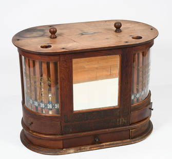 MARRICK'S SIX CORD SPOOL COTTON CABINET: MARRICK'S SIX CORD SPOOL COTTON CABINET: Merrick's Spool Cotton cabinet with two revolving dispensers behind curved glass having reverse gilt lettering. Mirrored panel at the observe & verso. Single d
