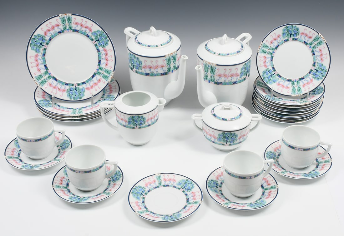 25 PC. BERNARDAUD LIMOGES "FLAMANTS ROSES" CHINA: 25 PC. BERNARDAUD LIMOGES "FLAMANTS ROSES" CHINA: Comprising; 2- Coffee Pots, 4- Dessert Plates, 4- Cups, 5- Saucers, 8- Bread Plates, 1- Creamer, & 1- Lidded Sugar Bowl. Largest Approx. 8" h x 9" l x