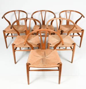6 HANS WEGNER FOR CARL HANSEN & SON CHAIRS: 6 HANS WEGNER FOR CARL HANSEN & SON CHAIRS: A set of Six Mid Century Modern Danish Oak "Wishbone" chairs with Paper Cord seats. Made in Denmark Circa 1960's by Hans Wegner for Carl Hansen & Son.