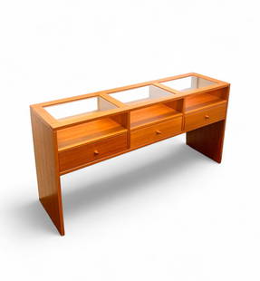 TEAK & GLASS TOP ROOM DIVIDER DISPLAY CABINET: TEAK & GLASS TOP ROOM DIVIDER DISPLAY CABINET: Having 3- open air glass top shelves over 3- Drawers with turned pulls, that open to either side. Approx. 28.5" h x 52.5" w x 17.75" d.