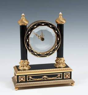 FRANKLIN MINT FABERGE MYSTERY CLOCK: FRANKLIN MINT FABERGE MYSTERY CLOCK: Faberge by Franklin Mint Mystery Clock, Circa 1988. Heavy Bronze or Brass with Black Marble. Swiss Made. Approx. 8.5" h x 7.25" w x 3.25" d.