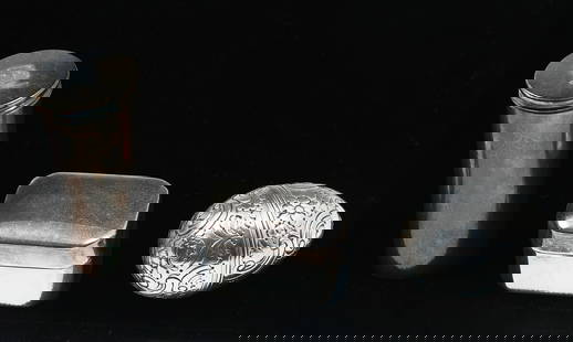 3 PC. ENGLISH STERLING SILVER NUTMEG GRATERS: 3 PC. ENGLISH STERLING SILVER NUTMEG GRATERS: Approx. 3.17 Troy ounces. Comprising; 1- Rectangular Grater, by Thomas Willmore. 1- Tall grater with 2 hinges that open to reveal the grater & storage are
