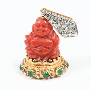 18K ART DECO CARVED RED NATURAL CORAL/ DIAMOND FOB: 18K ART DECO CARVED RED NATURAL CORAL/ DIAMOND FOB: 18K yellow gold fob/pendant contains one carved piece of red coral, depicting a stylized Buddha figure. 14 round brilliant and single cut diamonds.