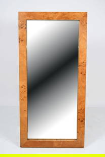 MILO BAUGHMAN BURL OLIVE WALL MIRROR: MILO BAUGHMAN BURL OLIVE WALL MIRROR: Burl Olive framed wall mirror by Milo Baughman. Approx. 46.75" h x 22.675" w x 1.5" d.
