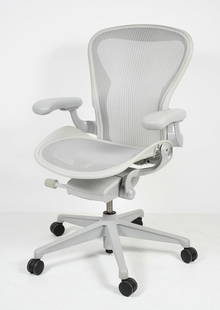 HERMAN MILLER AERON REMASTERED OFFICE CHAIR: HERMAN MILLER AERON REMASTERED OFFICE CHAIR: Medium size fully adjustable model, standard lumbar support, vinyl armrests. Approx. 41" h x 26" w x 26" d.