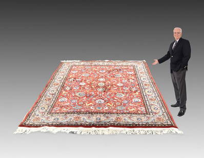 GIANT KIRMAN ESTATE ORIENTAL CARPET 14' x 10': ESTATE ORIENTAL CARPET PANEL GIANT KIRMAN 14' X 10': Carpet with red field enhanced with multicolor panels in shades of orange, brown and light blue. Woven of worsted wool in the USA by Karastan. Meas