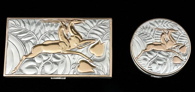2 PC. STERLING ART DECO COMPACT & CIGARETTE CASE: 2 PC. STERLING ART DECO COMPACT & CIGARETTE CASE: Approx. 8.90 Troy ounces. 2 Pc. Gold overlay Sterling Cigarette Case & Compact by Evans. Both have the same Gazelle & Foliate motif, both signed. Larg