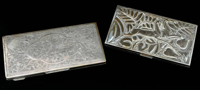 2 PC. SILVER GAZELLE MOTIF CIGARETTE CASES: 2 PC. SILVER GAZELLE MOTIF CIGARETTE CASES: Approx. 6.90 (.925), & 6.77 (.800). Troy ounces. Comprising; 1- Evans Sterling Silver Art Deco Cigarette Case, having a Leaping Gazelle & Foliate motif. 1-