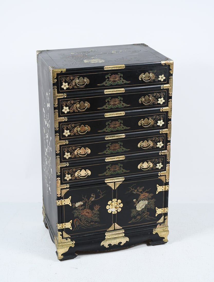 7-DRAWER JAPANESE LACQUERED SILVER CHEST: 7-DRAWER JAPANESE LACQUERED SILVER CHEST: Japanese silver chest covered in elegant black lacquer with floral designs. Features 7 drawers. Measures 35.25" (h) x 20.5" (w) x 14.5" (d).