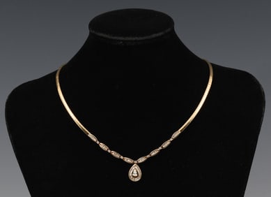 14K DIAMOND NECKLACE / OMEGA