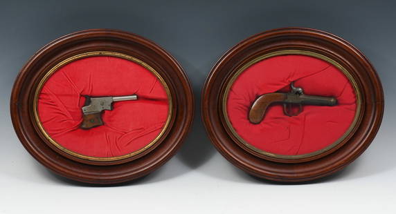 2 ANTIQUE FRAMED PISTOLS: 2 ANTIQUE FRAMED PISTOLS: Comprising; 1- Pietro Beretta Gardone V.T. Cal 7.65, Serial #A48455. 1- Universal Firearms Corp. of Hialeah, Florida. 30 Caliber Carbine Serial #308960. Both reside in Oval f