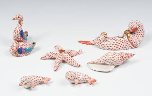 6 PC. HEREND PORCELAIN FISHNET SEA LIFE FIGURINES: 6 PC. HEREND PORCELAIN FISHNET SEA LIFE FIGURINES: Comprising; 2- Baby Seals, 1- Starfish, 1- Otter, 1- Conch Shell, & 1- Double Duck figurine. All in the red Fishnet pattern. Largest Approx. 7.5" l.