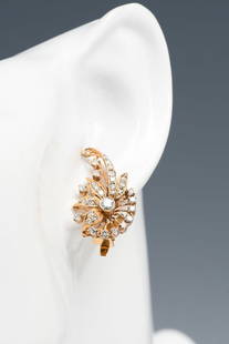 14K 1.00 CTW DIAMOND RETRO DECO EARCLIPS: 14K 1.00 CTW DIAMOND RETRO DECO EARCLIPS: 14K yellow gold earrings contains (2) round brilliant cut diamonds and (64) round single cut diamonds. WEIGHT: 1.00 Ct. Approx. Rated VS in clarity and G-H in