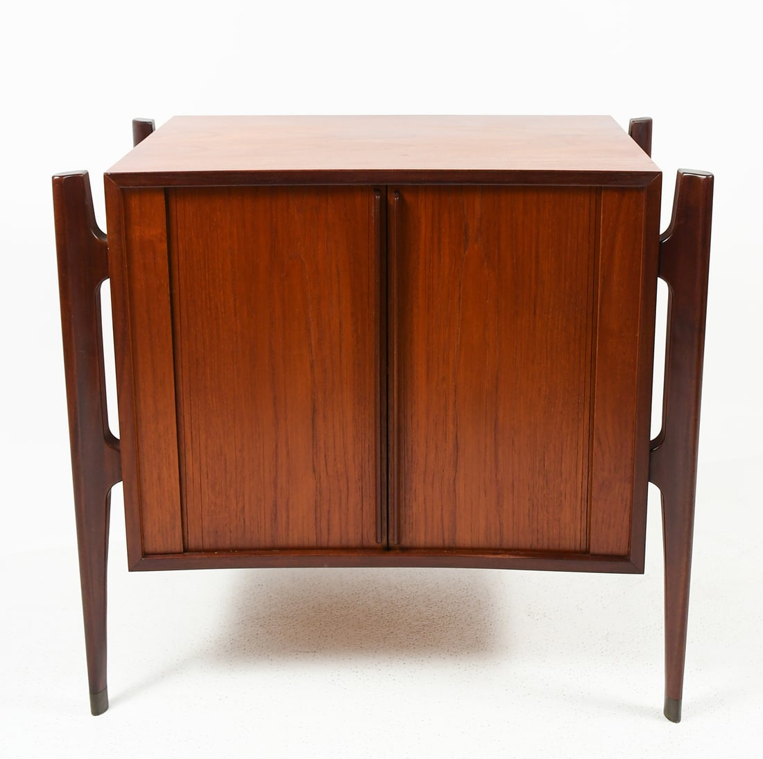 WILLIAM HINN TEAK NIGHTSTAND END TABLE: WILLIAM HINN TEAK NIGHTSTAND END TABLE: Jorgen Clausen for Brande Møbelfabrik Teak Bight Stand with Two Tambour doors that open to reveal a shelved Compartment. Raised on Sculpted & tapered legs with