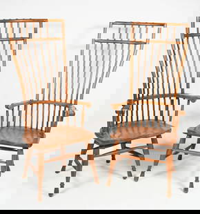 PR. HIBRITEN HIGHBACK WINDSOR ARMCHAIRS: PR. HIBRITEN HIGHBACK WINDSOR ARMCHAIRS: oak Windsor form dining chairs with curved dowel backrest and shaped seats. Raised on shaped Drumstick legs. Approx. 53.25" h x 25.75" w x 23.75" d.
