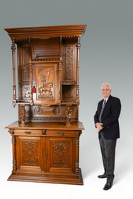 OAK BACK BAR CABINET WITH CARVED MEPHISTOPHELES