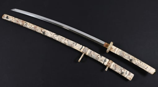 JAPANESE CARVED BONE SAMURAI SWORD