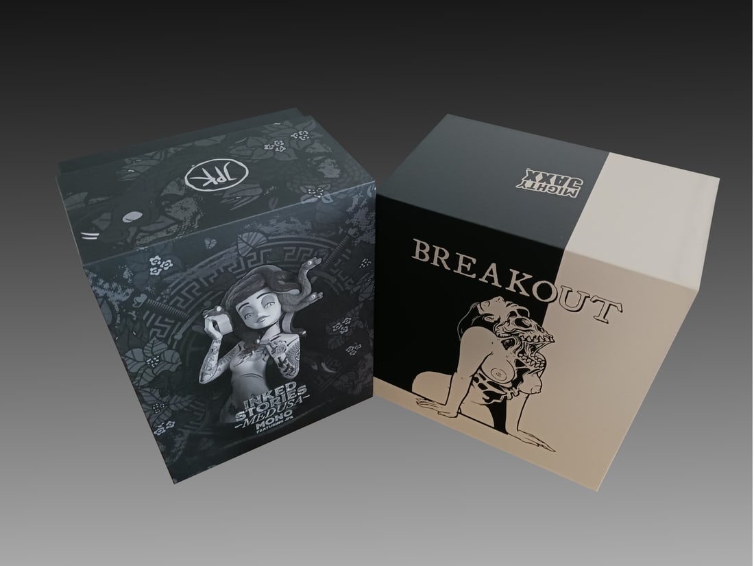 2PC. MIGHTY JAXX POLYSTONE BUSTS: 2PC. MIGHTY JAXX POLYSTONE BUSTS - "BREAKOUT" AND "INKED STORIES: MEDUSA": A pair of grayscale polystone sculptures produced by Mighty Jaxx. 1) "Breakout", depicting a woman's skeleton shrugging off h