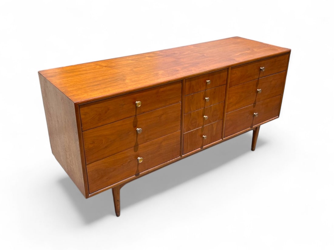 DREXEL DECLARATION 10 DRAWER CREDENZA DRESSER: DREXEL DECLARATION 10 DRAWER CREDENZA DRESSER: Drexel Declaration 10- Drawer Dresser designed by Kipp Stewart. All drawers have wood inset Brass pulls. Raised on tapered feet. Approx. 31.125" h x 62"